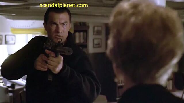 Erika eleniak nude scene in under siege scandalplanet.com